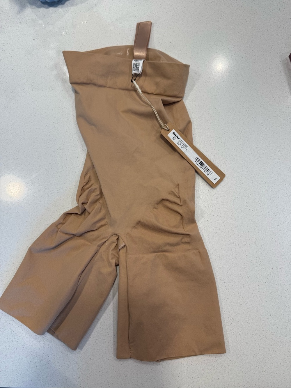 Skims sheer seamless mid-thigh short